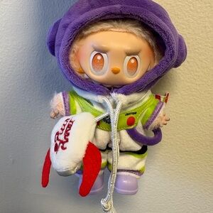 Purple and White Plush Toy with Red Accents doll not included